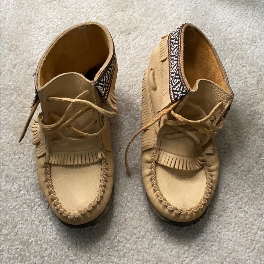 Tan coloured Moccasins.